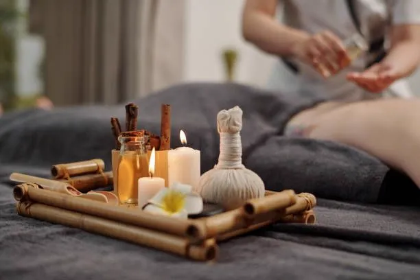 Herbal compress and aromatherapy oils for massage